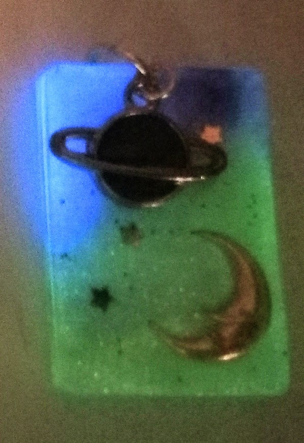 Saturn Moon UV Glow