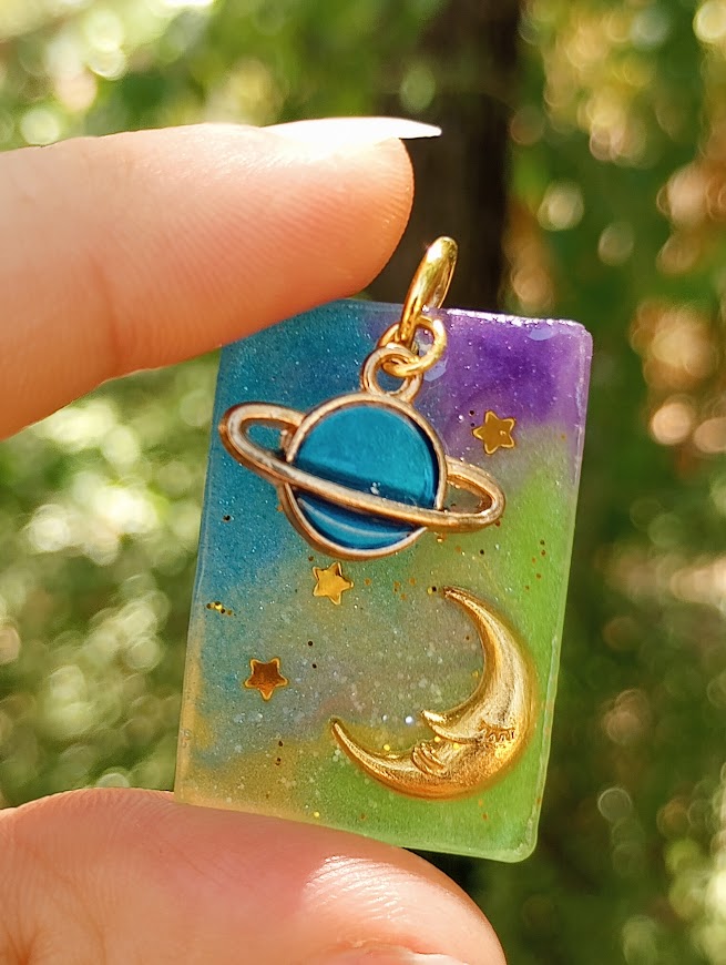 Saturn Moon UV Glow