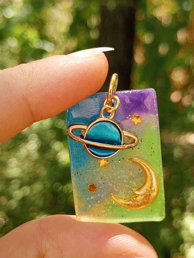 Saturn Moon UV Glow